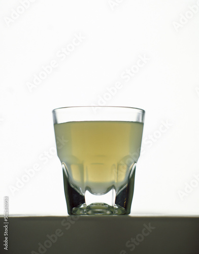 Alcoholic drink in a shot glass photo