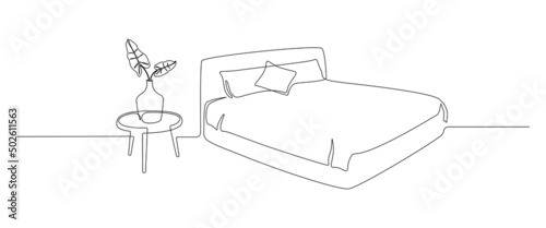 Continuous one line drawing of double bed with pillows and table with vase and plant. Modern loft furniture for stylish bedroom in simple linear style. Editable stroke. Doodle vector illustration