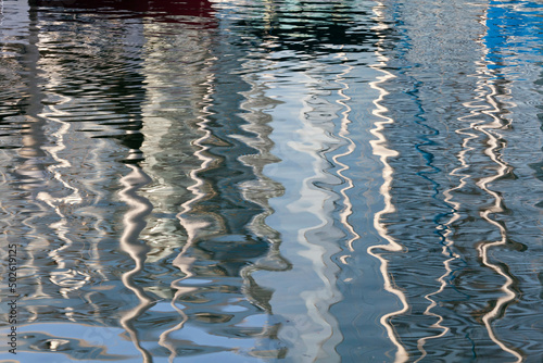 Abstract reflections of sailboats in water, Seaport Village, San Diego, California, USA