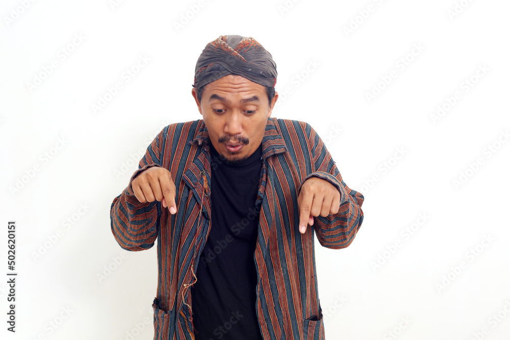 Asian man standing and presenting something below. Isolated on white background Asian man standing and presenting something below. Isolated on white background