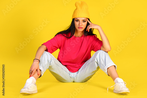 Serious young woman in a casual style clothes