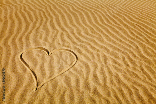Heart shape drawn on sand on the beach, Pacific Beach, Washington State, USA