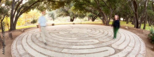 Mexico, Tecate, Rancho La Purerta, Man and woman walking in labyrinth