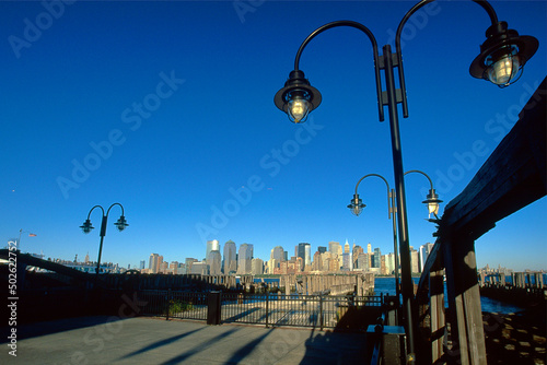 USA, New Jersey, Jersey City, Ferry Piers of Liberty State Park with Manhattan's skyline in distance photo