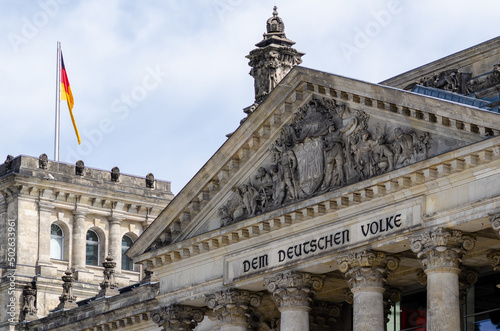 The Reichstag building (Bundestag) in Berlin, Germany, meeting place of the German parliament: The inscription says: Dem Deutschen Volke - To the German people photo