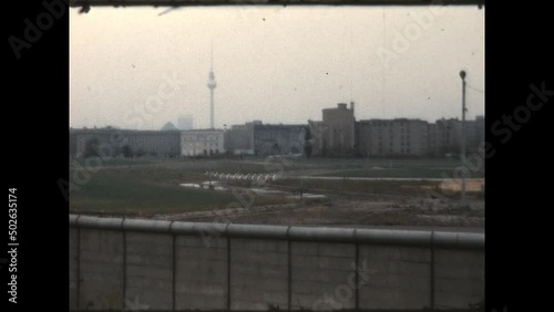 East Berlin from the Wall 1970 - Panning view of Potsdamer Platz and the Fernsehturm Tower in East Berlin from a viewing platform in West Berlin, on the other side of the Berlin Wall, in 1970.   photo