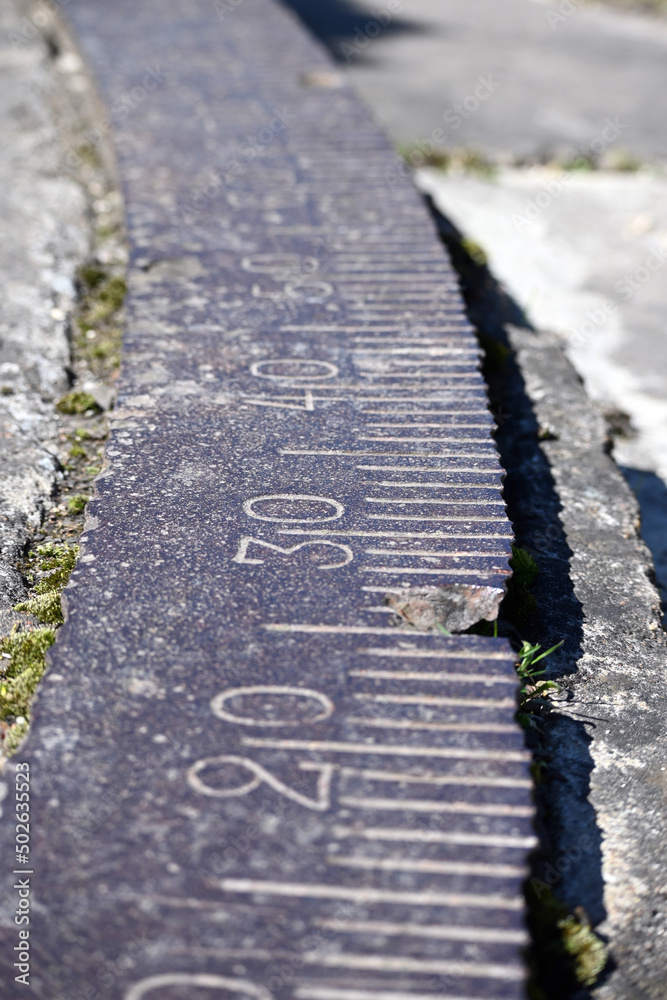 An old graduated scale for turning an artillery piece by degrees for ...