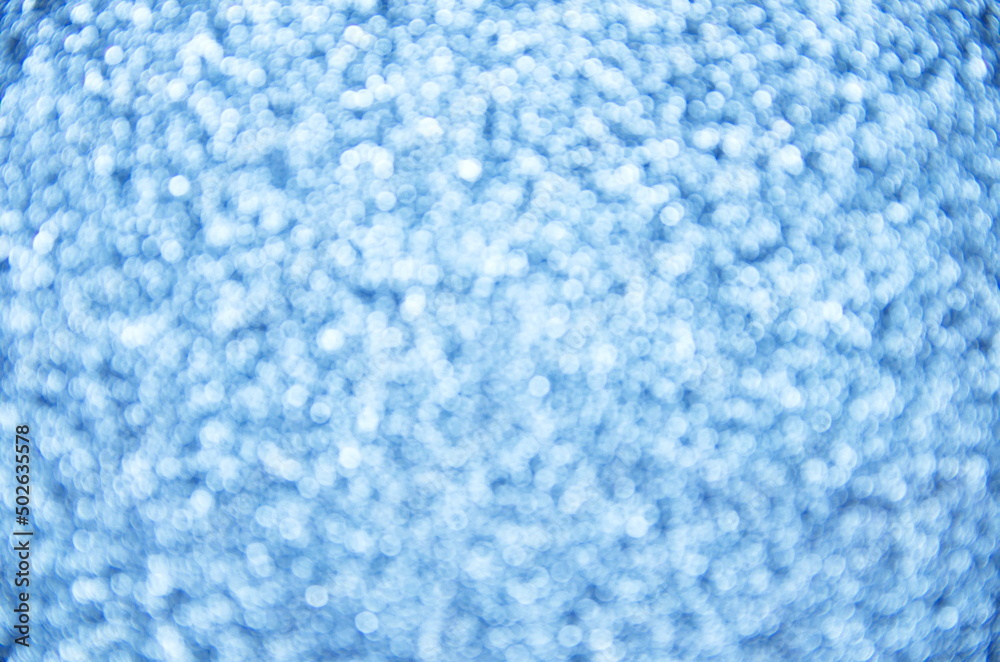Obraz premium Festive background. Blue background with bokeh. Blurred background. Abstraction circles.