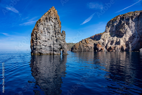 Sizilien: Die fantastischen Felsnadeln Faraglioni vor der Insel Lipari - Blick vom Boot aus photo