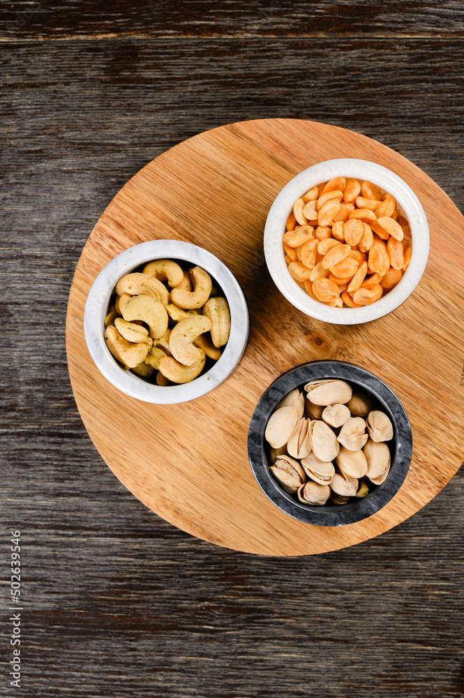 assorted pistachios, cashews and peanuts assorted pistachios, cashews and peanuts