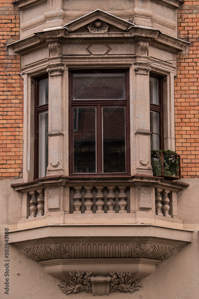 Obraz premium Munich, Germany - May 01, 2022: Old Decorative Wooden window.