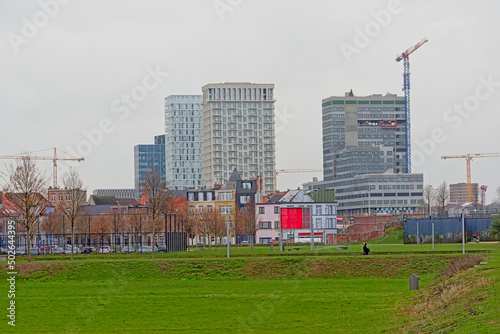 Park spoor noord, city landscape park in Antwerp with new skyscrapers behind in Antwerp