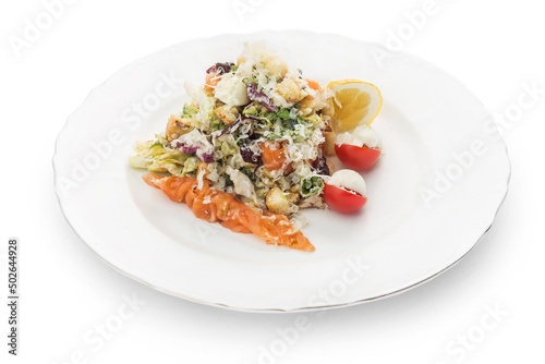 Salad, red fish on a plate, Ukrainian cuisine. Photo of food on a white background