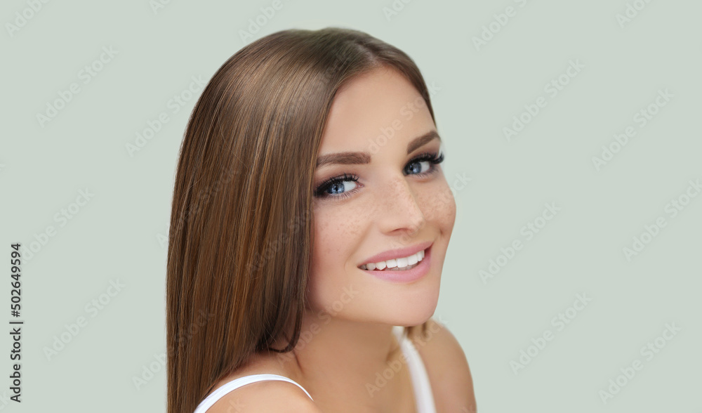 Freckles. Portrait of a young blond girl with blue eyes