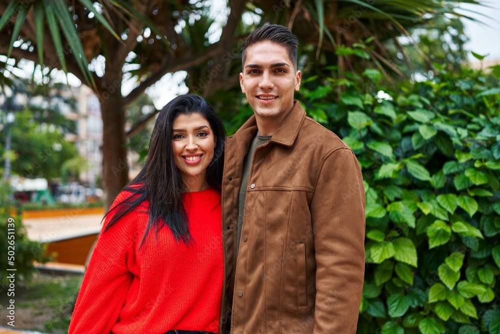 Man and woman couple smiling confident hugging each other at park Man and woman couple smiling confident hugging each other at park