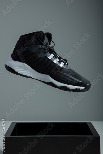Running sneaker on non isolated background 