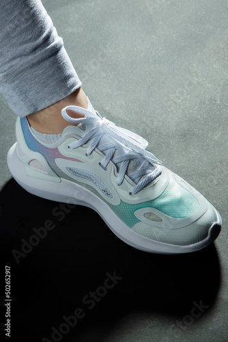 Running sneaker on non isolated background 