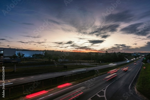 Freeway. Traffic lights tracks at sunset. Long exposure. D. Pedro I highway, Atibaia, Brazil.