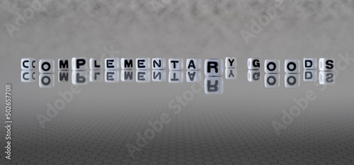 Canvas Print complementary goods word or concept represented by black and white letter cubes