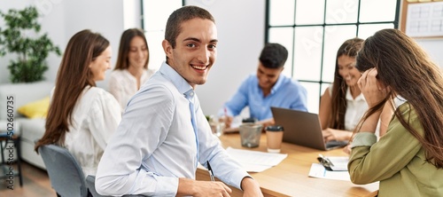 Group of business workers smiling happy working at the office.