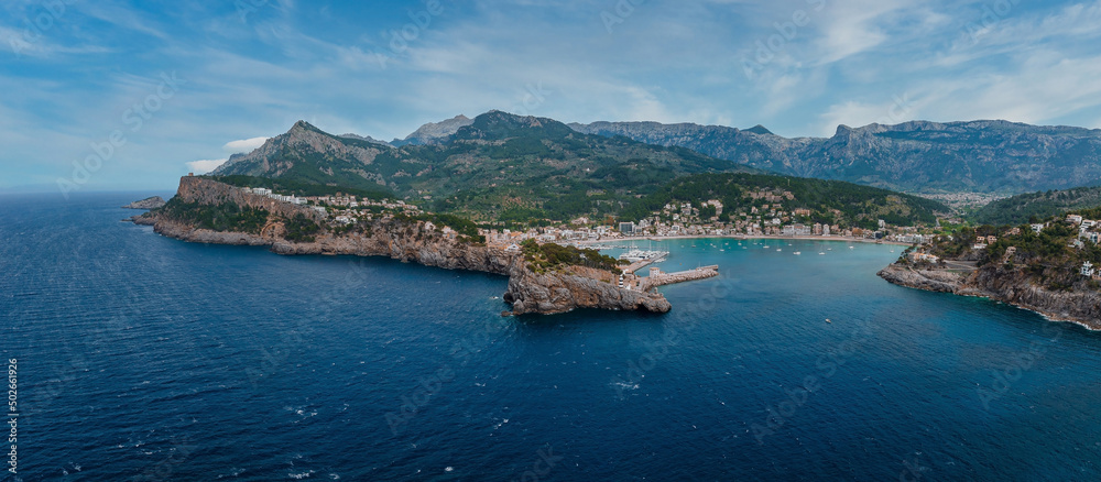 Beautiful aerial view of the lighthouse near harbour of Port de Soller, Mallorca, Spain