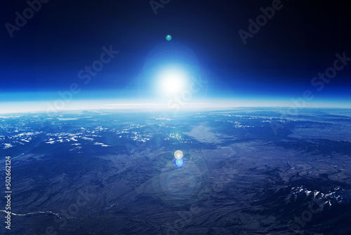 Fototapeta Naklejka Na Ścianę i Meble -  Sunrise over the planet from space. Elements of this image furnished by NASA