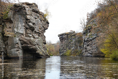 Granite rocks of Bukski Canyon with the Girskyi Tikych River. Picturesque landscape and beautiful place in Ukraine photo