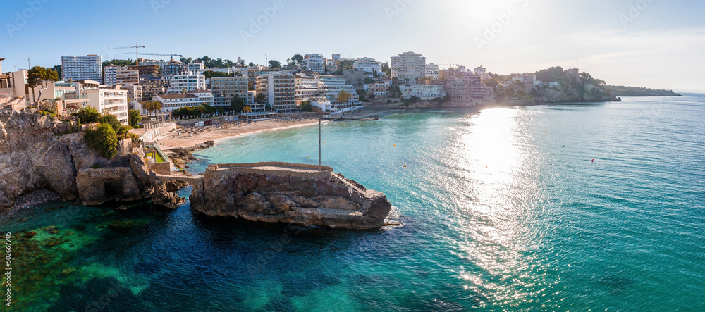 Fototapeta premium Aerial view of the capital of Mallorca - Palma de Mallorca in Spain. A touristic city by the sea.