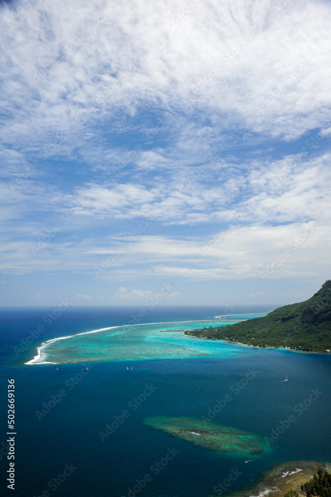 View of aqua colored reef encircling Moorea, French Polynesia