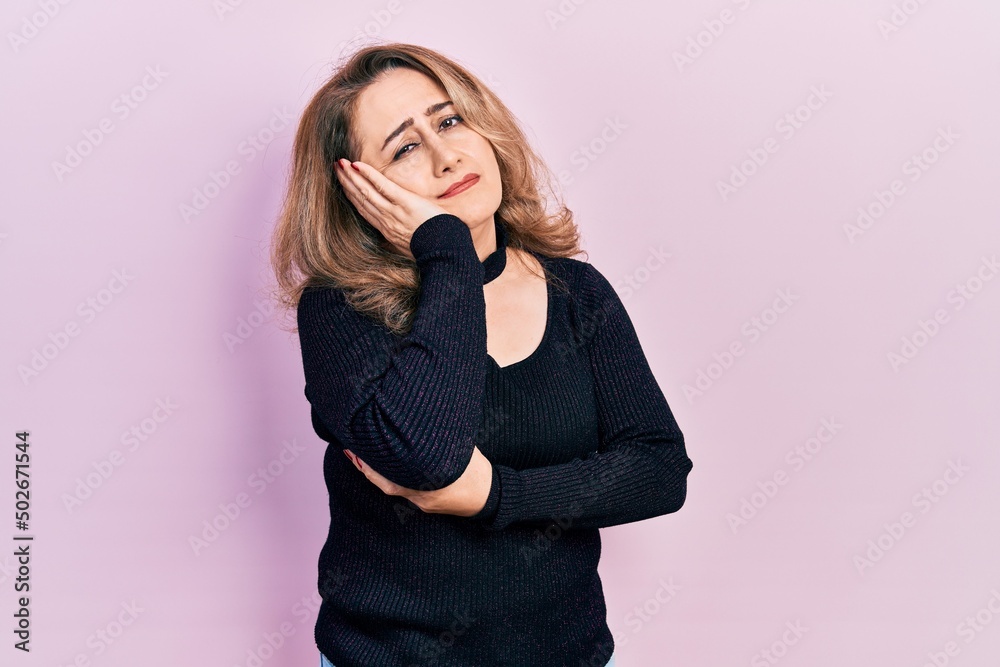 Middle age caucasian woman wearing casual clothes thinking looking tired and bored with depression problems with crossed arms.
