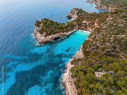 Fototapeta Naklejka Na Ścianę i Meble -  Aerial view, Cala d'es Moro, rocky coast at Cala de s'Almonia, nature reserve Cala Llombards, Mallorca, Balearic Islands, Spain