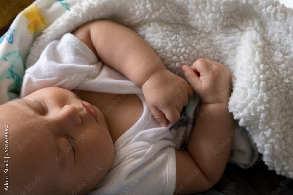 Latin baby sleeping in daddy arms Latin baby sleeping in daddy arms