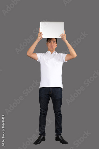 Businessman holding banner with copy space