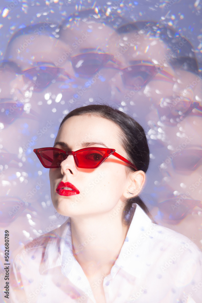 art portrait of a woman in green glasses with red lipstick on her lips in a white shirt art portrait of a woman in green glasses with red lipstick on her lips in a white shirt