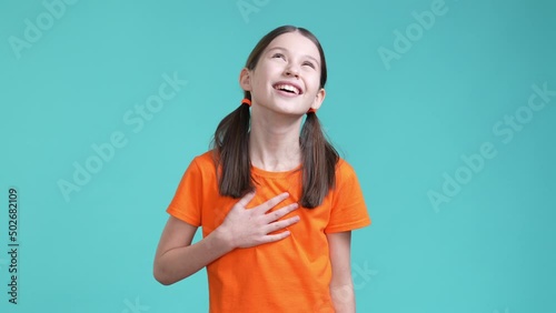 Schoolchild laughing loud friend joke isolated cyan color background