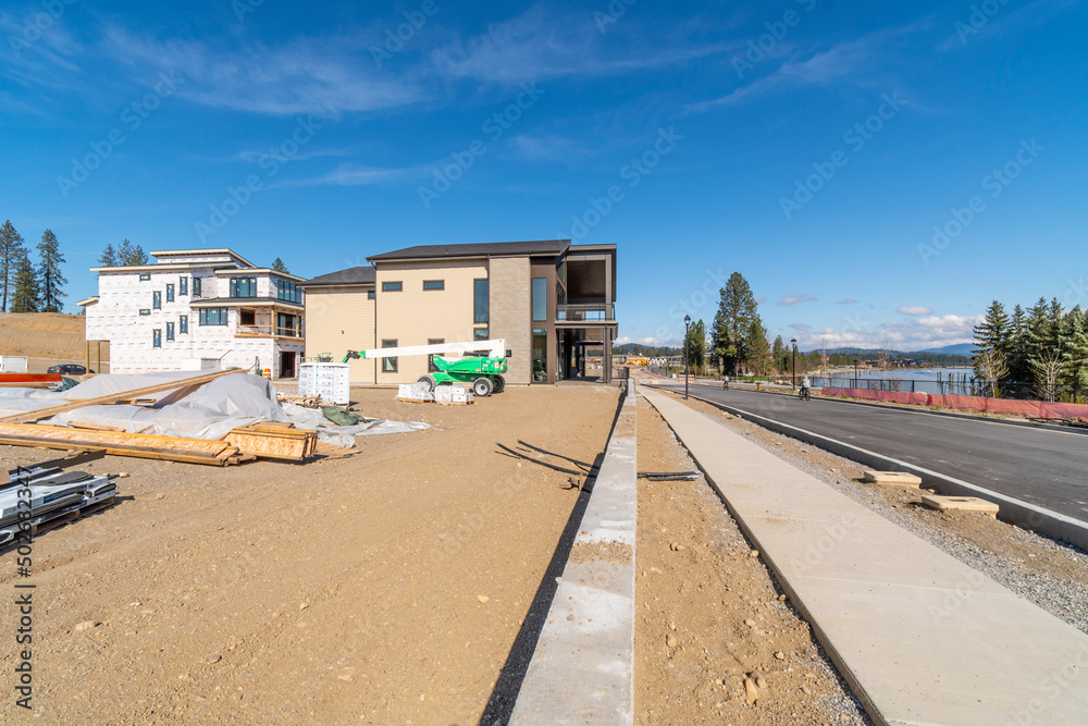 New luxury waterfront homes under construction along the Spokane River in Coeur d'Alene, Idaho. New luxury waterfront homes under construction along the Spokane River in Coeur d'Alene, Idaho.