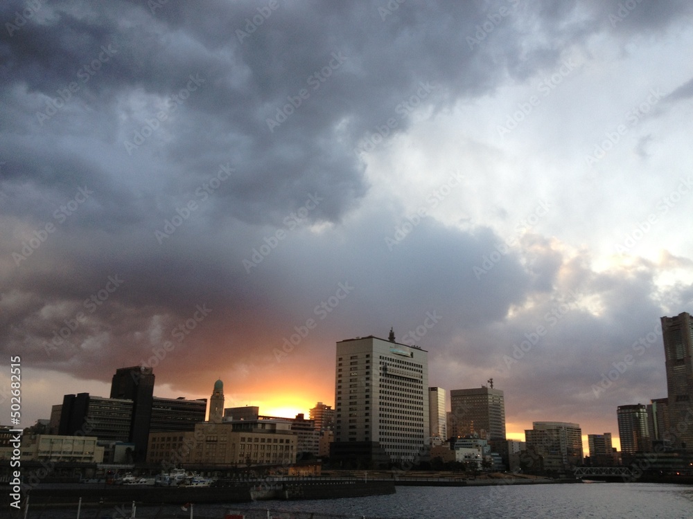 time clouds over city