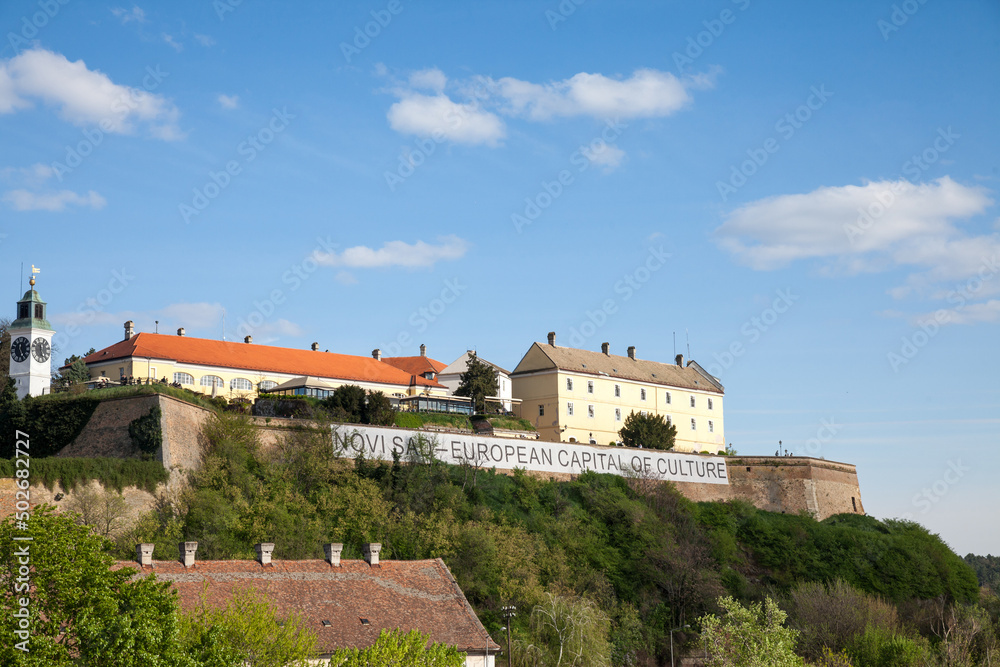 Petrovaradin Fortress in Novi Sad, Serbia. This castle is one of the main landmarks of Novi Sad and Voivodina, with a banner indicating novi sad is the european capital of culture...