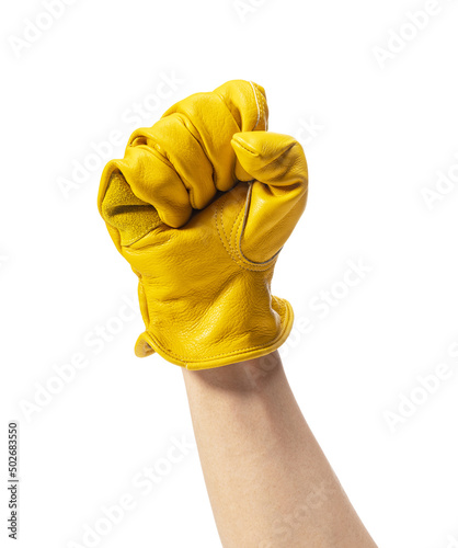 Fotografie, Obraz Male hand wearing yellow leather glove on white background