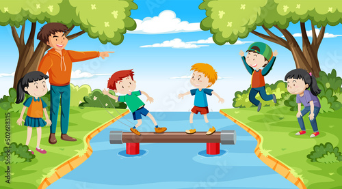 Children balancing on beam at the park