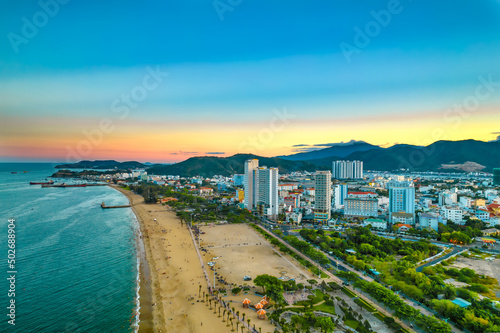 Schilderij op canvas The coastal city of Nha Trang seen from above in the afternoon with its beautifu