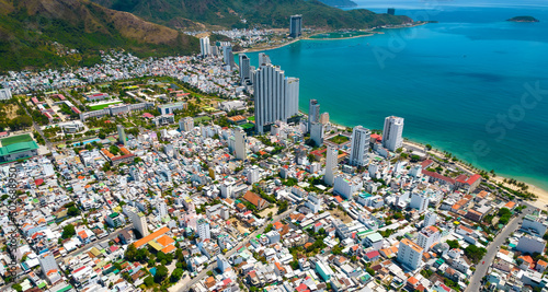 The coastal city of Nha Trang seen from above on a sunny summer afternoon. This is a famous city for cultural tourism in central Vietnam © huythoai