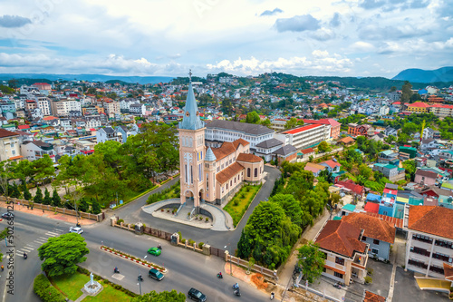 Aerial view outside Cathedral chicken on a morning. Old French architecture attracts parishioners to pray for peace at the weekend in Da Lat, Vietnam