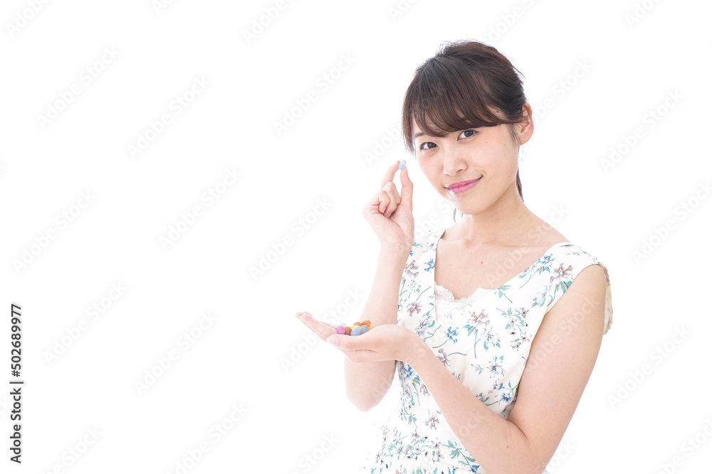 Young woman having snacks
