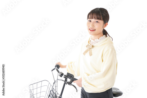 Young woman riding bike