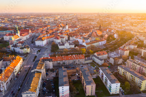 Carta da parati Scenic aerial view of historical center of Polish town of Kalisz at sunset in spring, Greater Poland Voivodeship