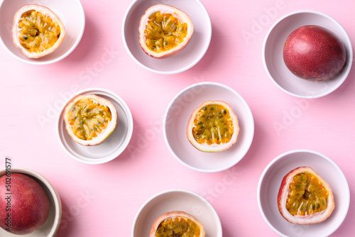 Passion fruit on pink, Tropical fruit in summer season