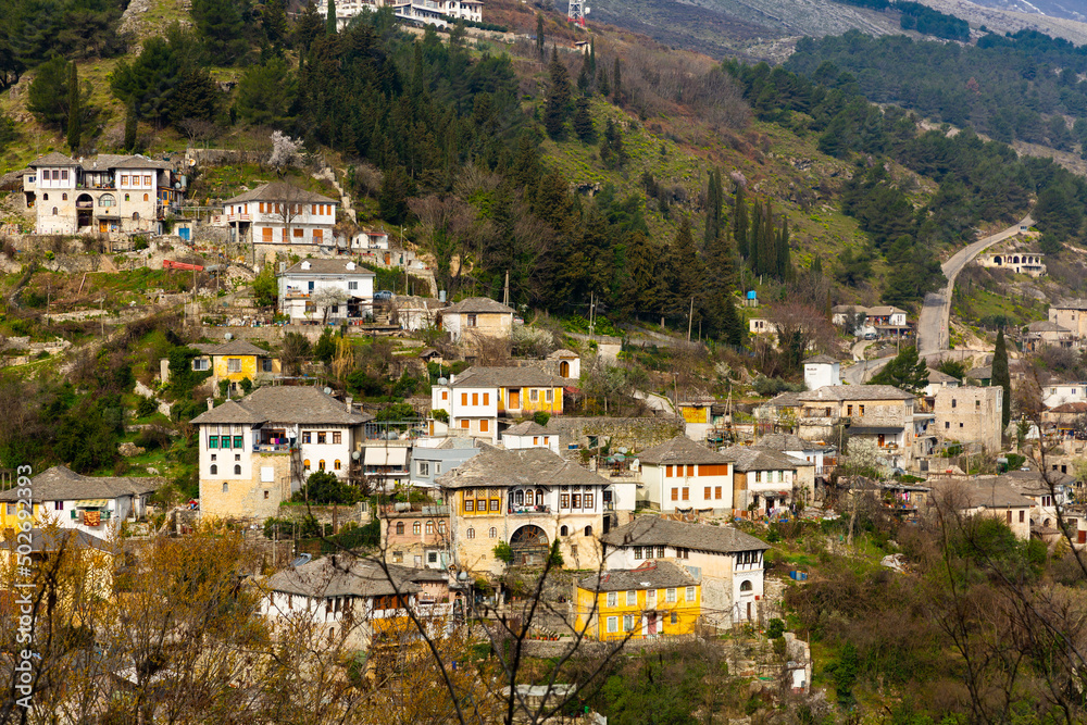 Spring landscape with a view of the residential quarters of the ancient city of Gjirokastra, included in the UNESCO World ..Heritage List, Albania
