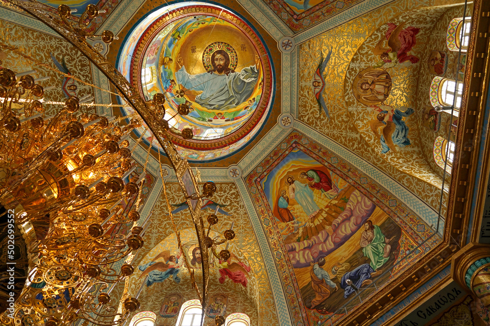 religious buildings. Pochayiv, Ukraine - interior decoration of the cathedral in the Pochaev Lavra. Interior of Holy Dormition Pochayiv Lavra, Ukraine. May 2021