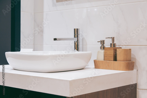 Spacious apartment - Modern wash basin in new bathroom interior. photo
